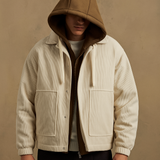 Men’s white corduroy shacket with hood layered underneath, featuring front pockets and a rugged yet refined design.