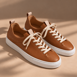 Pair of Brown Montaro leather sneakers with cream contrast laces