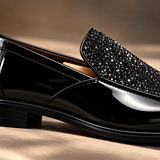 Close-up of the patent leather heel and glitter vamp on Roma Lucido loafers in Black