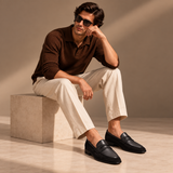 Man wearing Milano Black suede penny loafers