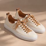 Pair of White Montaro leather sneakers with tan contrast laces