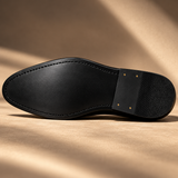 Sole view of Roma Lucido patent loafers showing the leather sole and heel