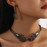 Halloween statement necklace with skeleton hand design