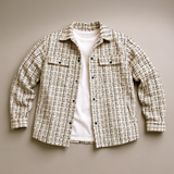 Men’s cream plaid tweed shacket overshirt with chest pockets, layered over t-shirt.